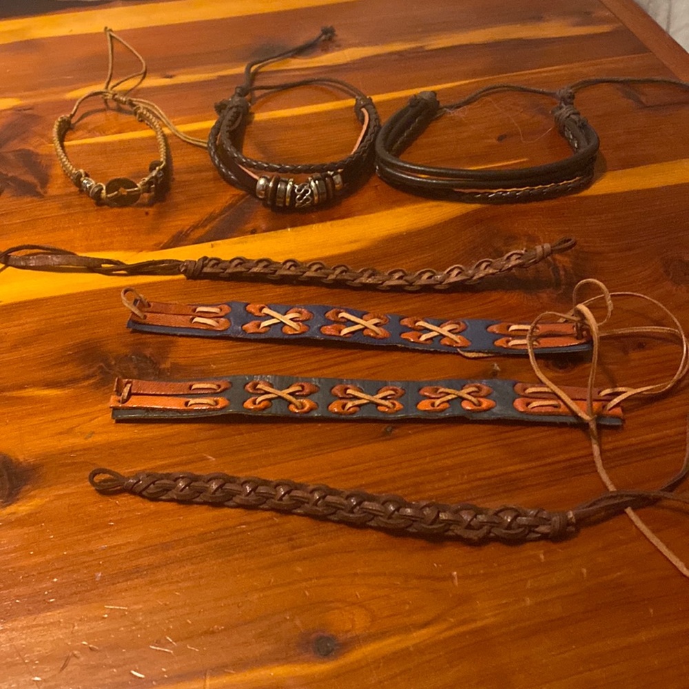 Set of fabric/leather bracelets good condition